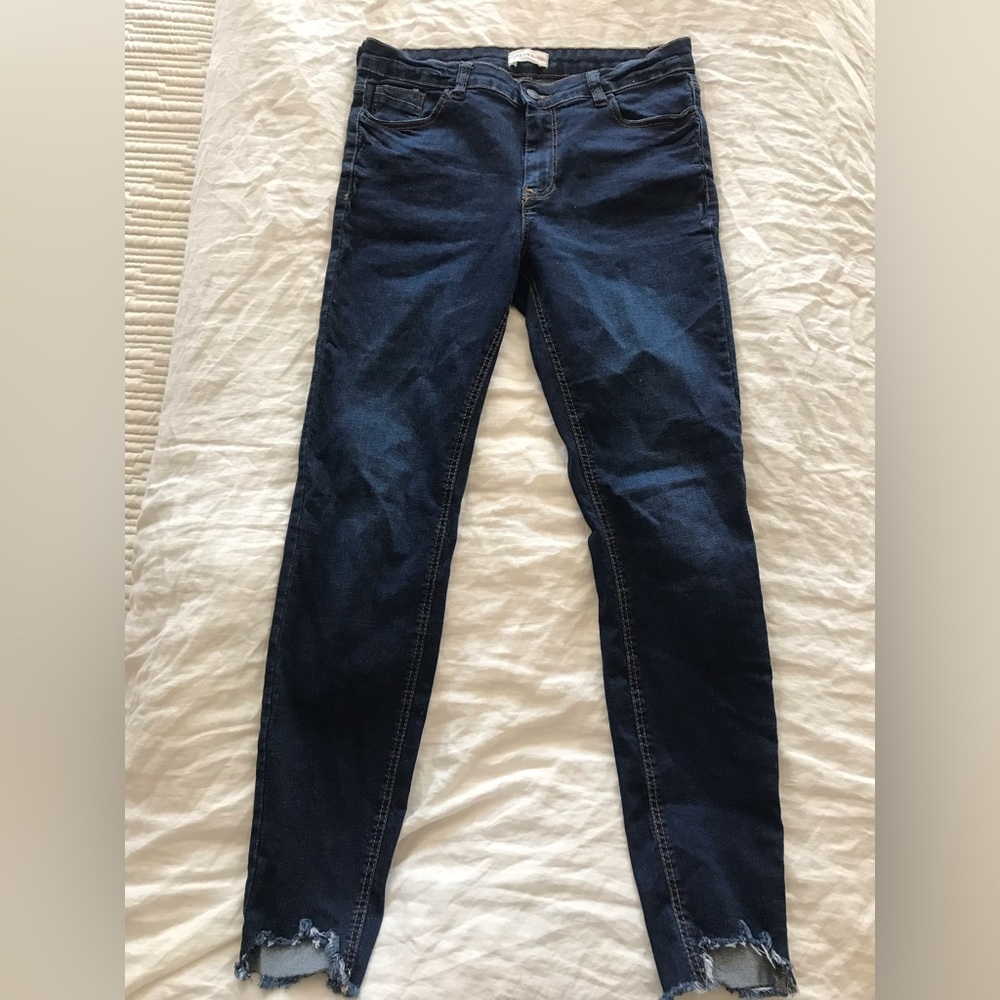 Classic blue jeans with distress